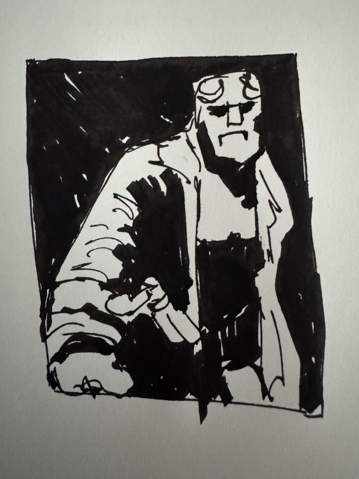 Black-and-white ink drawing of Hellboy, with heavy shadows and bold shapes.